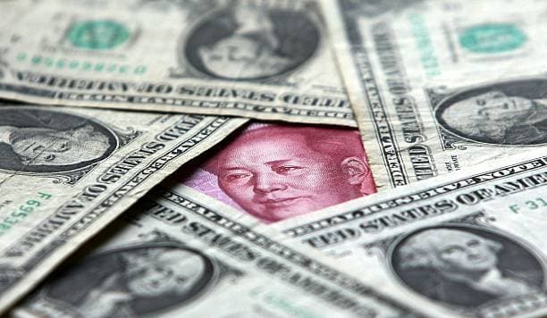 China's yuan holds steady, set for fourth weekly rise